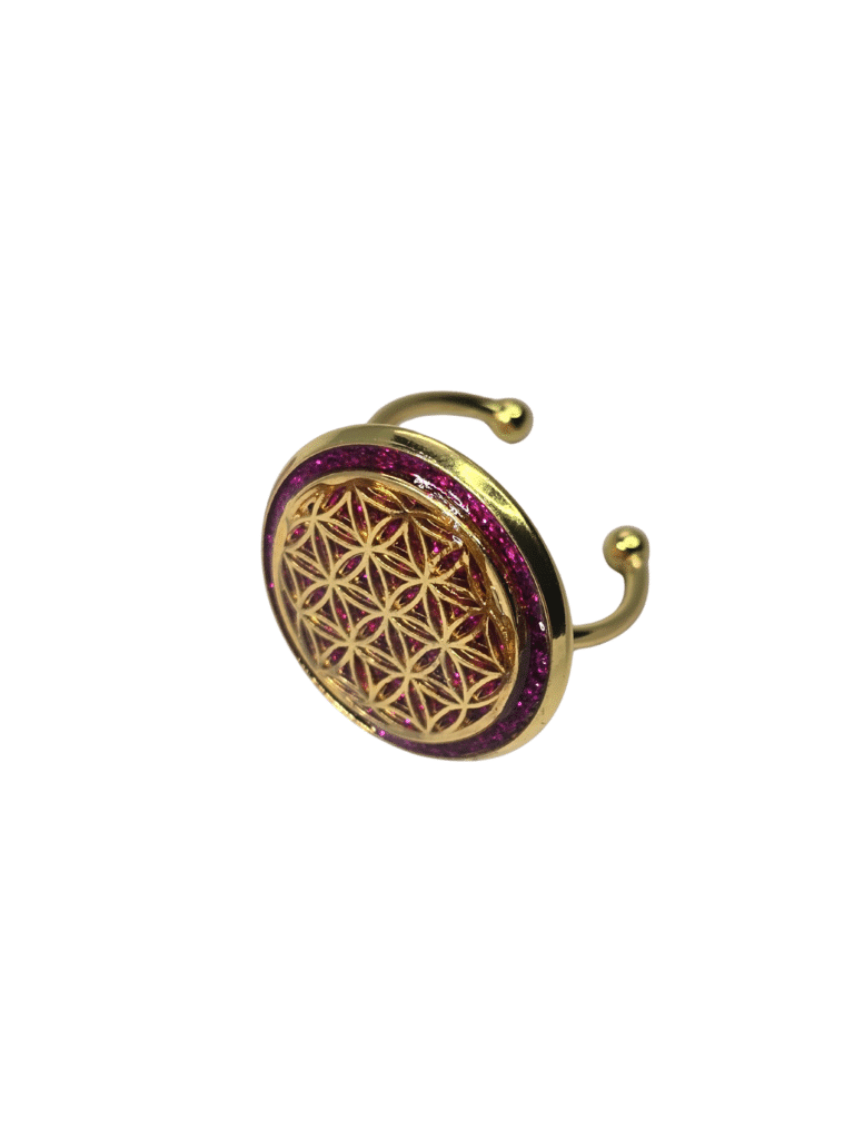 Bague Fleur de Vie fuchsia Éclat Intérieur en acier inoxydable dorée, motif rond avec résine pailletée